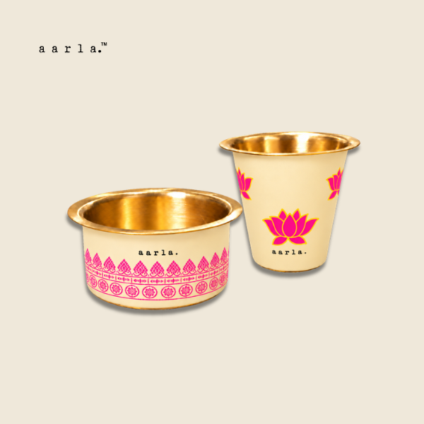 Aarla Pink Lotus brass dabara tumbler set on beige background