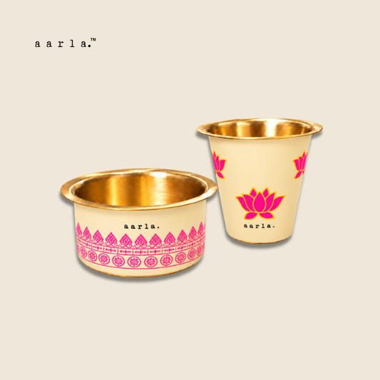 Aarla Pink Lotus brass dabara tumbler set on beige background