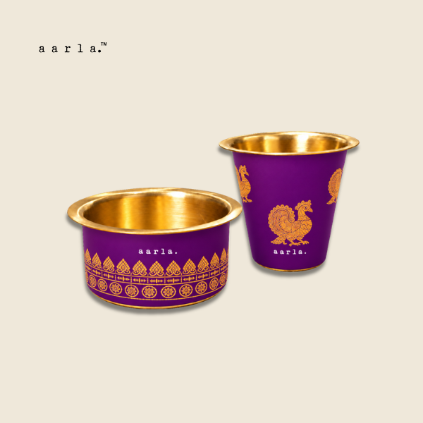 Aarla Purple Annapakshi brass dabara tumbler set on beige background